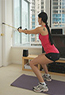 Lady doing resistance bands workout